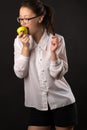 Beautiful girl eating green apple Royalty Free Stock Photo