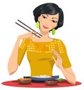 Beautiful girl eats with chopsticks