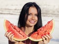 Beautiful girl eats water-melon Royalty Free Stock Photo