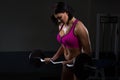 Beautiful girl is engaged in the gym. Halthy concept with vulture or dumbbell.