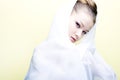 Beautiful girl enveloped in white headscarf Royalty Free Stock Photo
