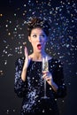 Beautiful girl in evening dress with wine glass. New Year's Eve. Royalty Free Stock Photo