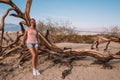 Beautiful girl exploring and hiking down death valley desert