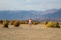 Beautiful girl exploring and hiking down death valley desert Royalty Free Stock Photo