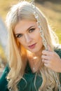 Beautiful girl face closeup, outside portrait of young woman. Summer romantic casual woman. Young woman on sunny summer Royalty Free Stock Photo