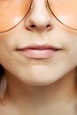 Beautiful girl fashion portrait. Abstract face wearing glasses