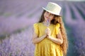 Beautiful girl in a field with lavender. Royalty Free Stock Photo