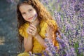 Beautiful girl in a field with lavender. Royalty Free Stock Photo