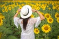 Beautiful girl in field of sunflowers Royalty Free Stock Photo