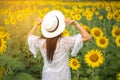 Beautiful girl in field of sunflowers Royalty Free Stock Photo