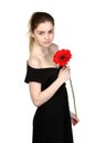 Beautiful girl with flower in black dress Royalty Free Stock Photo