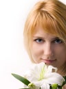 Beautiful girl with the flower of lily Royalty Free Stock Photo