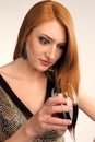 Beautiful girl frowns on alcohol Royalty Free Stock Photo