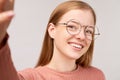 Beautiful girl with ginger hair  on wall Royalty Free Stock Photo