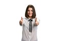 Beautiful girl giving two thumbs up. Royalty Free Stock Photo