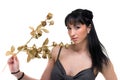 Beautiful Girl With Golden Flowers isolated over white Royalty Free Stock Photo