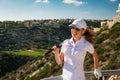Beautiful girl golfer in golf club Royalty Free Stock Photo