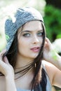 Beautiful girl with green eyes in city park. Woman beauty face portrait Royalty Free Stock Photo