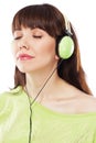 Beautiful girl with green headphones Royalty Free Stock Photo