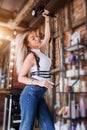 Beautiful girl with hair dryer in beauty salon Royalty Free Stock Photo