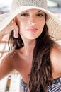 Beautiful girl with hat at the beach Royalty Free Stock Photo