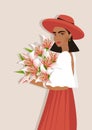 Beautiful girl in a hat with lily flowers in her hands Royalty Free Stock Photo