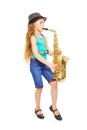 Beautiful girl with hat playing alto saxophone Royalty Free Stock Photo