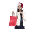 Beautiful girl hat santa brunette package for shopping isolated braces Royalty Free Stock Photo