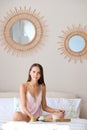 Beautiful girl having breakfast in bed Royalty Free Stock Photo