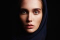 Religious young woman.beauty girl in hood Royalty Free Stock Photo