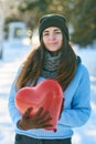 Beautiful girl with heart shaped balloon in hands Royalty Free Stock Photo