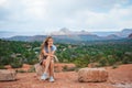 Girl enjoys the view of the Sedona landscape from the top of the Bell Rock hiking trail, famous for its many energy Royalty Free Stock Photo