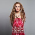 Beautiful girl hippies with dreadlocks. pretty young woman