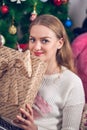 Beautiful girl holding a gift box. Christmas, Time of miracles Royalty Free Stock Photo