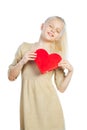 Beautiful girl holding heart in arms. Royalty Free Stock Photo