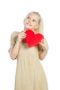 Beautiful girl holding heart in arms. Royalty Free Stock Photo