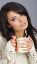 Beautiful girl holding hot tea cup Royalty Free Stock Photo