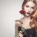 Beautiful girl holding a rose Royalty Free Stock Photo