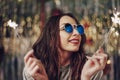 Beautiful girl holding sparklers in hands Royalty Free Stock Photo