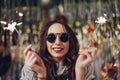 Beautiful girl holding sparklers in hands Royalty Free Stock Photo