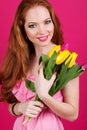 Beautiful girl is holding tulips, spring time Royalty Free Stock Photo