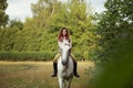 Beautiful girl on a horse.