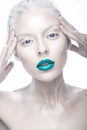 Beautiful girl in the image of albino with blue lips and white eyes. Art beauty face. Royalty Free Stock Photo