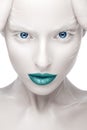 Beautiful girl in the image of albino with blue lips and white eyes. Art beauty face.