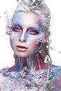 Beautiful girl in the image of a snowy unicorn creature. Creative make up. Art look. Royalty Free Stock Photo