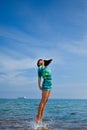 Beautiful girl jumping out of sea Royalty Free Stock Photo