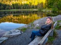 Beautiful girl by the lake