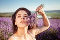 A beautiful girl in a lavender field. Beauty, beautiful makeup Royalty Free Stock Photo