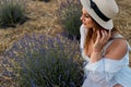 A beautiful girl in a lavender field. Beauty, beautiful makeup, lavender perfume, fashion. A professional model for advertising, Royalty Free Stock Photo