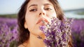 A beautiful girl in a lavender field. Beauty, beautiful makeup Royalty Free Stock Photo